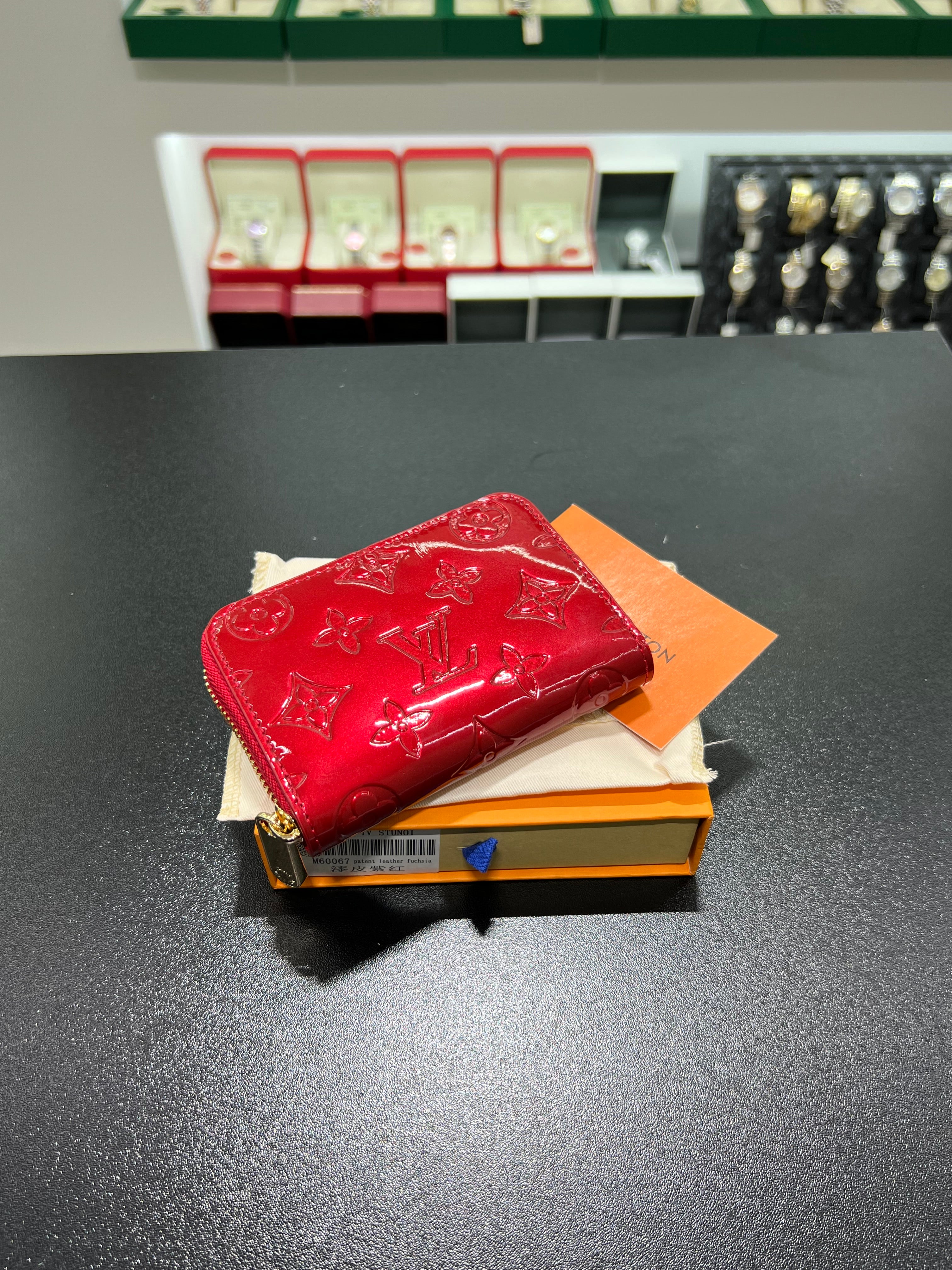 LV shiny red wallet